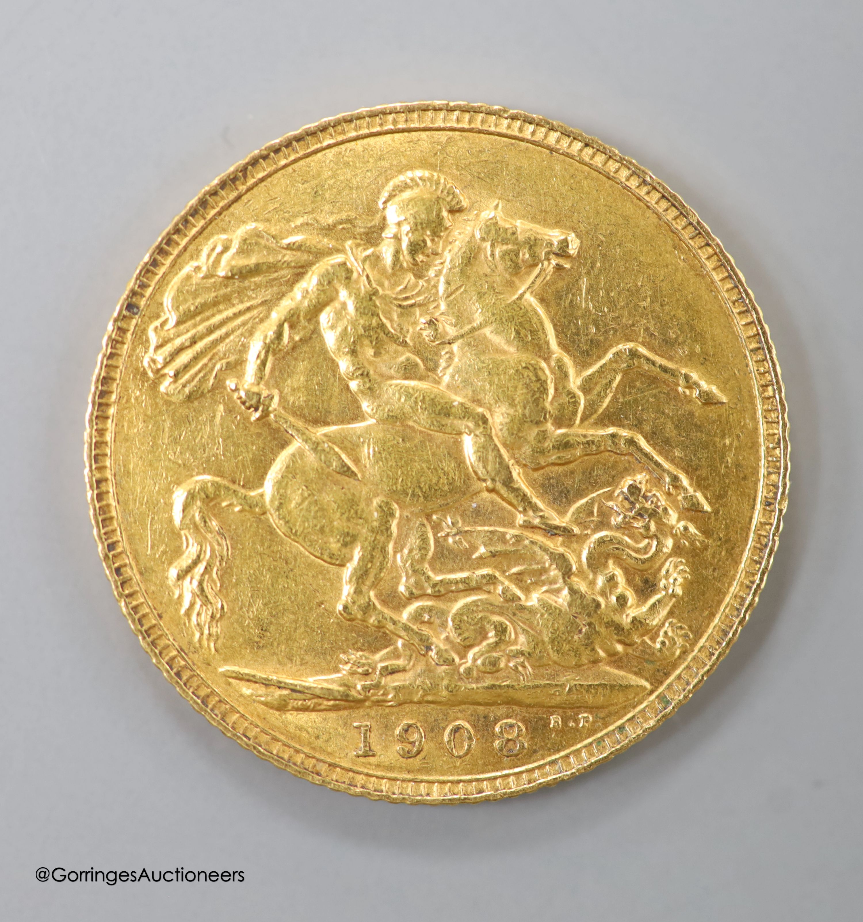 An Edward VII 1908 gold sovereign.
